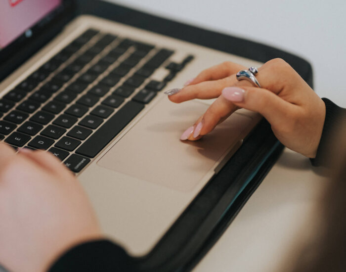 A SEO specialist using a Mac for specialist SEO agency